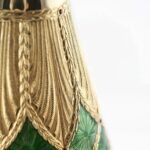 Detail of the Stefano Vigni's Champagne bottle cover Emerald. Inspired by the renowned Fabergé Eggs
