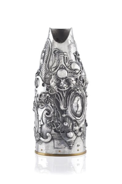 Handcrafted by the florentine master goldsmith Giuliano Foglia, this is the front of Fantasy Champagne bottle cover that has intricately chiseled a series of surrealistic images