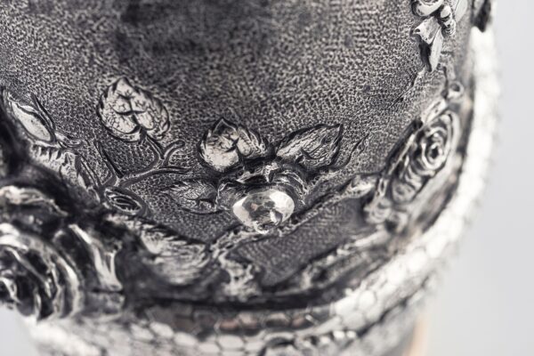 Detail of Serpent and Roses Champagne Bottle Cover