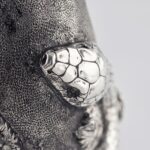 Detail of Serpent and Roses Champagne Bottle Cover