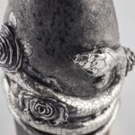 Detail of Serpent and Roses Champagne Bottle Cover
