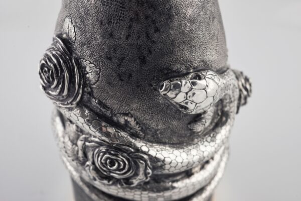 Detail of Serpent and Roses Champagne Bottle Cover