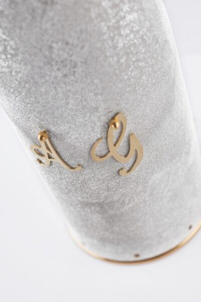 Detail of champagne bottle cover Your Wedding
