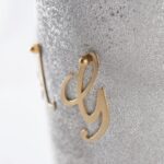 Detail of champagne bottle cover Your Wedding