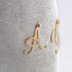 Detail of champagne bottle cover Your Wedding