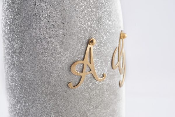 Detail of champagne bottle cover Your Wedding