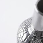 Detail of the Wine bottle cover Alligator