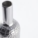 Detail of the Wine bottle cover Alligator