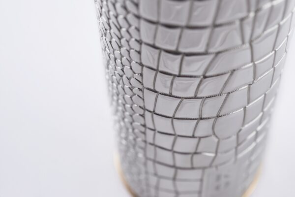 Detail of the Wine bottle cover Alligator