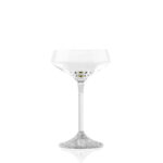 Elegant coupe glass with a clear, wide bowl and a sleek silver metal stem. The base features a textured finish with a small engraved logo, blending modern design with refined craftsmanship.