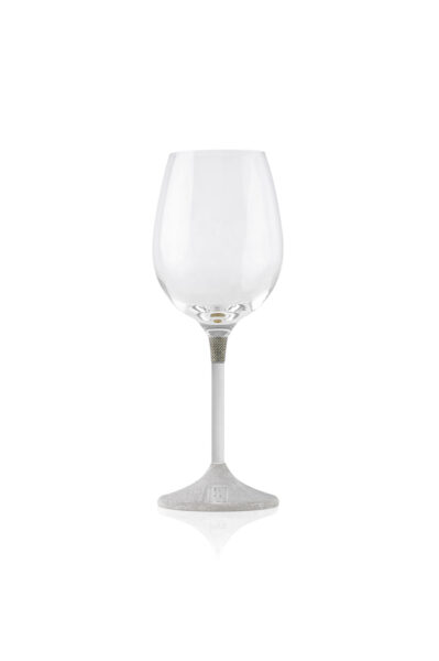 Single wine glass with a sleek, modern design. The clear glass cup sits atop a slim metal stem, which transitions into a textured, silver-finished base featuring a small plaque engraved with the word 'KOVER'.