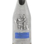 Champagne bottle cover celebrating Napoli Campione d’Italia 2023, silver with blue enamel.