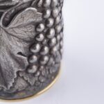 Detail of the Champagne bottle cover Grapes