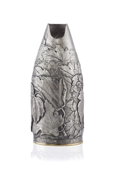 Detail of the Champagne bottle cover Grapes