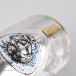 Detail of the Champagne bottle cover "Alchimia"