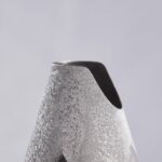Detail of the Champagne bottle cover "Alchimia"