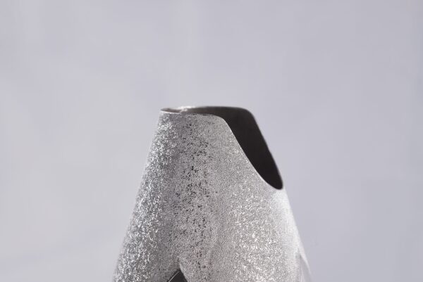 Detail of the Champagne bottle cover "Alchimia"