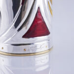 Detail of the master craftsman's signature of the Champagne bottle cover "Incontro"