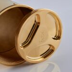 Detail of the gold screwing of the chamapagne bottle cover