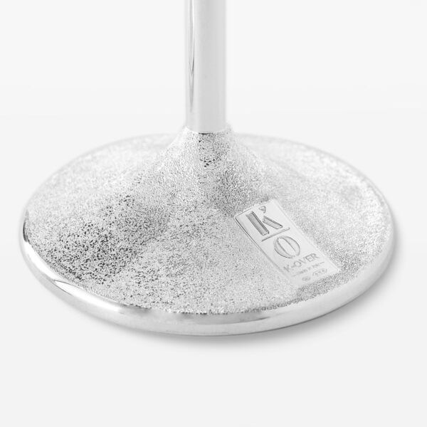 detail of the silver stem of the wine glass
